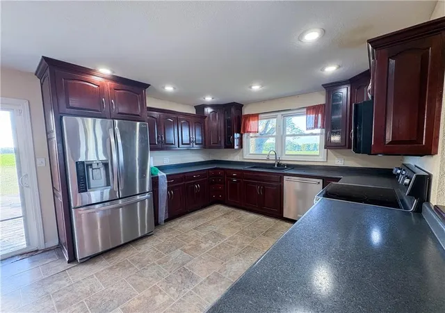 Photo 3 of Single family home for sale at 390 NW H Hwy, Warrensburg, MO 64093 | MLS# 2646269 | Listing updated on 2026-10-18