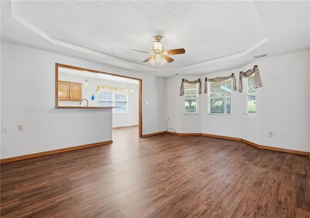 Photo 3 of Single family home for sale at 502 S Saturn Dr, Raymore, MO 64083 | MLS# 2646277 | Listing updated on 2026-10-10