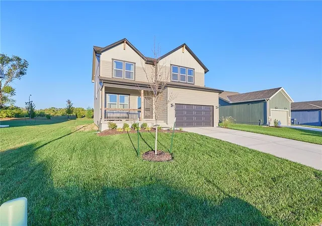 Photo 1 of Single family home for sale at 404 Woodview Dr, Raymore, MO 64083 | MLS# 2646332 | Listing updated on 2026-10-09