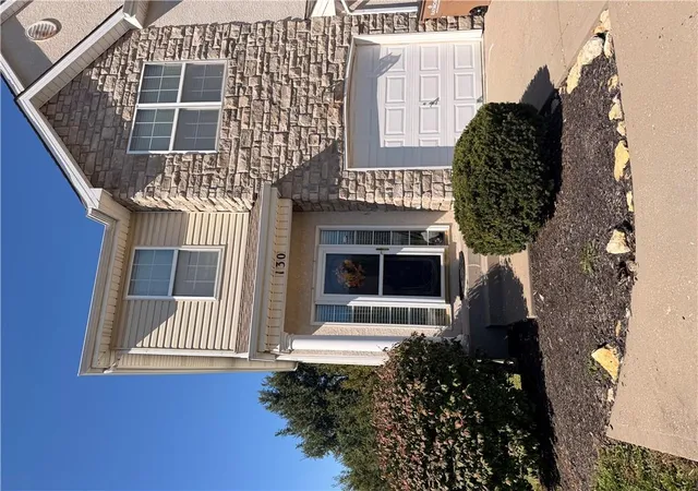 Photo 1 of Townhouse for sale at 130 Mott Dr, Raymore, MO 64083 | MLS# 2646368 | Listing updated on 2026-10-10