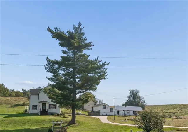 Photo 2 of Single family home for sale at 26876 Tonganoxie Dr, Leavenworth, KS 66048 | MLS# 2646550 | Listing updated on 2026-10-16