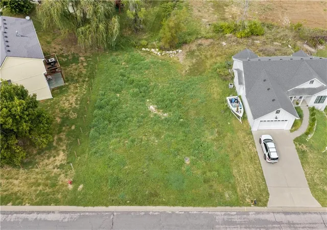 Photo 1 of Single family home for sale at 104 E Whispering Hills Blvd, Lone Jack, MO 64070 | MLS# 2646783 | Listing updated on 2026-10-16