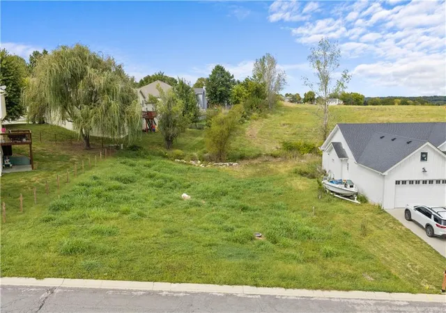 Photo 2 of Single family home for sale at 104 E Whispering Hills Blvd, Lone Jack, MO 64070 | MLS# 2646783 | Listing updated on 2026-10-16