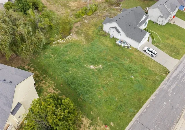 Photo 3 of Single family home for sale at 104 E Whispering Hills Blvd, Lone Jack, MO 64070 | MLS# 2646783 | Listing updated on 2026-10-16