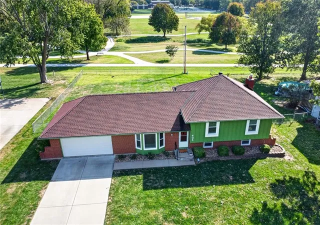 Photo 3 of Single family home for sale at 405 S Park Dr, Raymore, MO 64083 | MLS# 2646806 | Listing updated on 2026-10-18