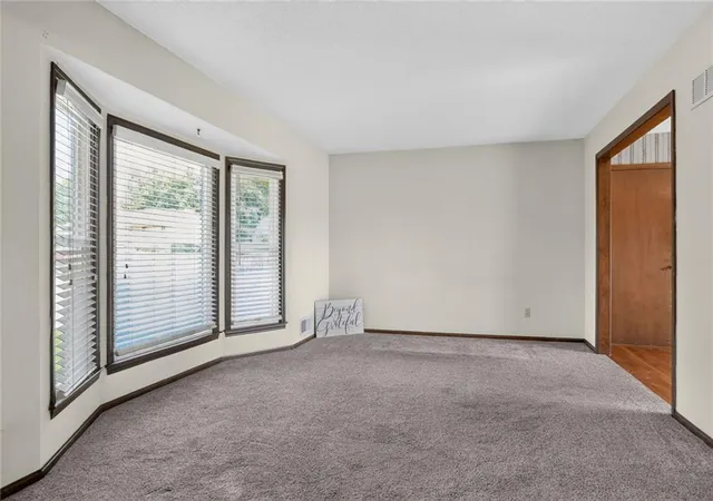 Photo 3 of Single family home for sale at 405 S Park Dr, Raymore, MO 64083 | MLS# 2646806 | Listing updated on 2026-10-18