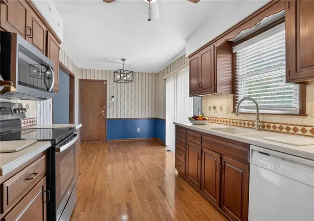 Photo 4 of Single family home for sale at 405 S Park Dr, Raymore, MO 64083 | MLS# 2646806 | Listing updated on 2026-10-18
