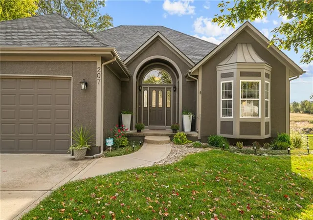 Photo 2 of Single family home for sale at 207 Peach Tree Ave, Lone Jack, MO 64070 | MLS# 2647003 | Listing updated on 2026-10-17