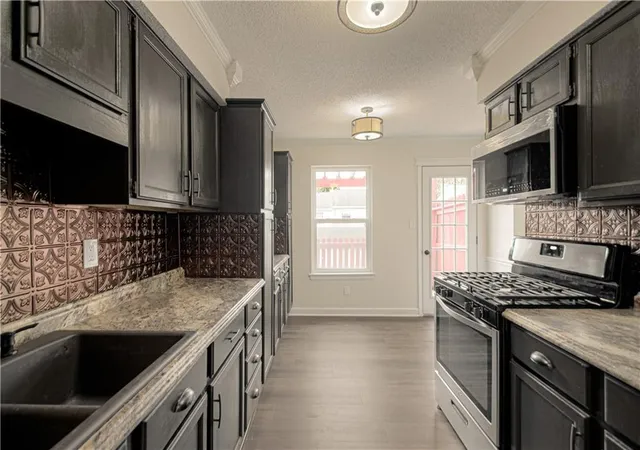 Photo 3 of Townhouse for sale at 6616 E 128th Street, Grandview, MO 64030 | MLS# 2647055 | Listing updated on 2026-10-23