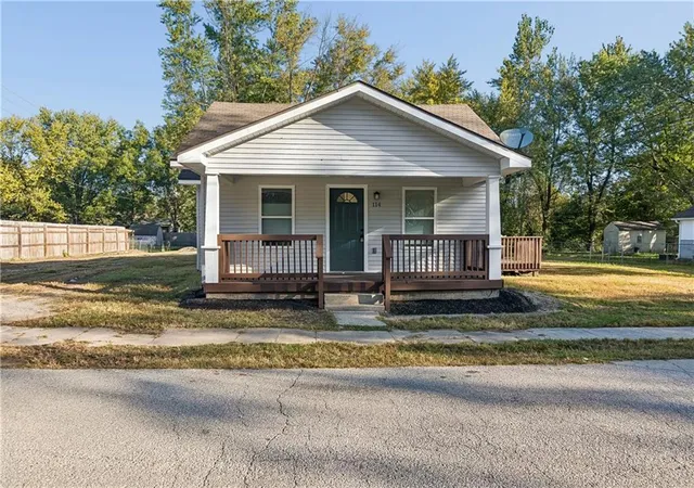 Single family home for sale at 114 W 2nd Street, Garden City, MO 64747 | MLS# 2647066