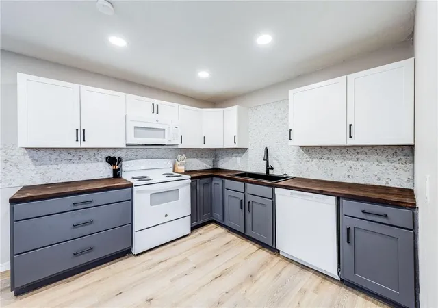 Photo 3 of Single family home for sale at 117 W Jackson St, Coffeyville, KS 67337 | MLS# 2647126 | Listing updated on 2026-10-15