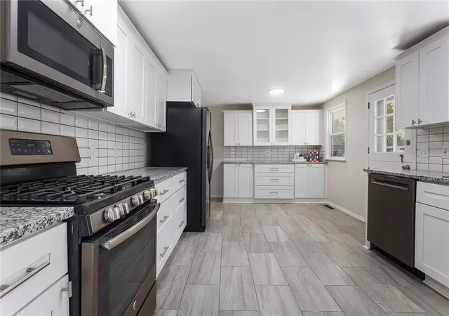 Photo 3 of Single family home for sale at 1001 NE 46th Terrace, Kansas City, MO 64116 | MLS# 2647268 | Listing updated on 2026-10-19