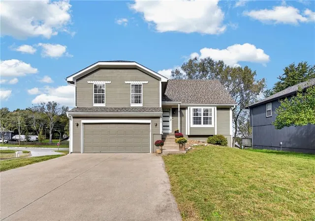 Single family home for sale at 309 Shenandoah Dr, Raymore, MO 64083 | MLS# 2647941