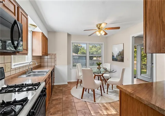 Photo 3 of Single family home for sale at 7512 N Baltimore Ave, Kansas City, MO 64118 | MLS# 2648006 | Listing updated on 2026-10-23