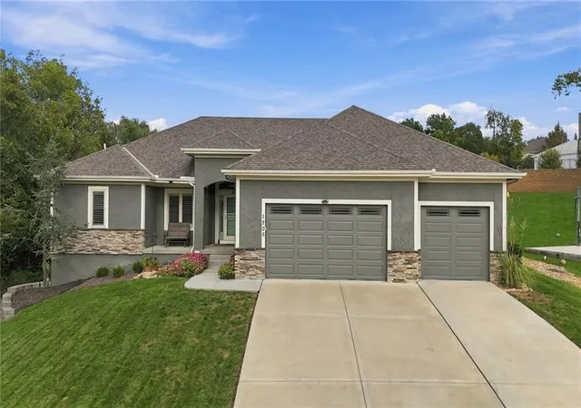 Photo 1 of Single family home for sale at 1205 SE Woodbine Dr, Blue Springs, MO 64014 | MLS# 2648019 | Listing updated on 2026-10-30
