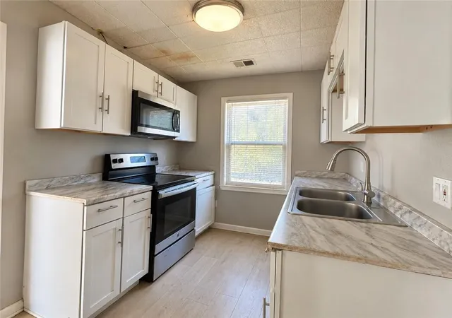 Photo 4 of Single family home for sale at 3118 Spruce Ave, Kansas City, MO 64128 | MLS# 2648029 | Listing updated on 2026-10-28