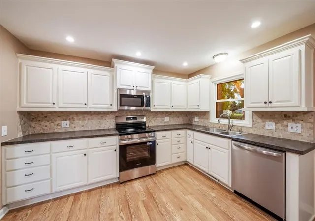 Photo 2 of Single family home for sale at 705 Sw Mitchell St, Oak Grove, MO 64075 | MLS# 2648092 | Listing updated on 2026-10-22