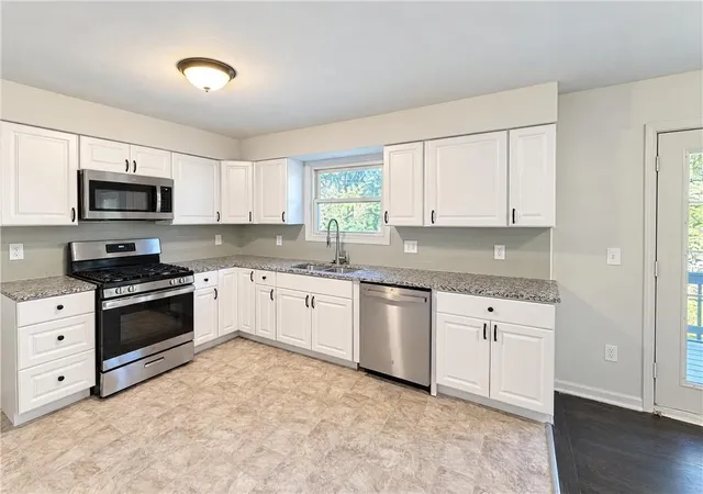 Photo 2 of Single family home for sale at 1400 65th Terrace, Kansas City, MO 64118 | MLS# 2648280 | Listing updated on 2026-10-22