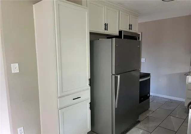 Photo 4 of Single family home for sale at 502 NW Central St, Lees Summit, MO 64063 | MLS# 2648408 | Listing updated on 2026-10-25