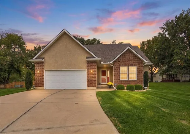 Photo 1 of Single family home for sale at 1128 SW Hoke Ct, Lees Summit, MO 64081 | MLS# 2648896 | Listing updated on 2026-10-29