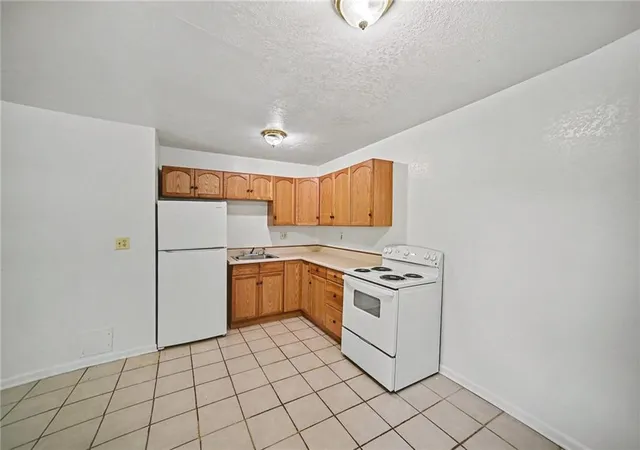 Photo 4 of House for sale at 1329-1331 N 64th Terrace, Kansas City, KS 66102 | MLS# 2649054 | Listing updated on 2026-10-28