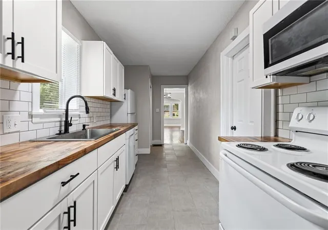 Photo 4 of Single family home for sale at 5247 Olive St, Kansas City, MO 64130 | MLS# 2649151 | Listing updated on 2026-10-28