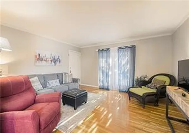 Listing Photo 1 - Condo for sale in building located at 4203 Clark Ave, Kansas City, MO 64111 - Unit #1