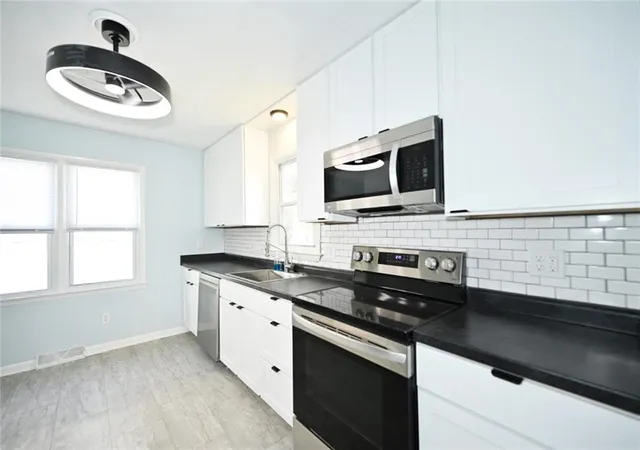 Photo 3 of Single family home for sale at 1926 Ewing Ave, Kansas City, MO 64126 | MLS# 2649459 | Listing updated on 2026-10-30