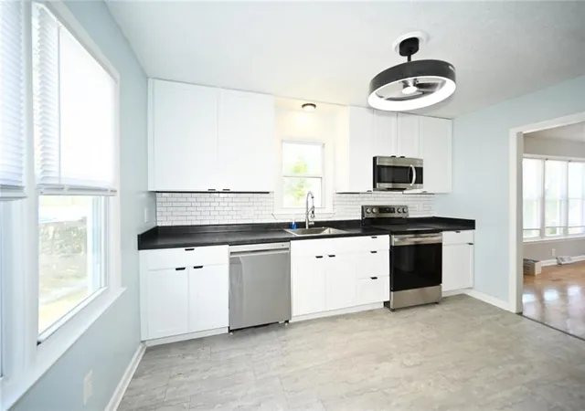 Photo 4 of Single family home for sale at 1926 Ewing Ave, Kansas City, MO 64126 | MLS# 2649459 | Listing updated on 2026-10-30