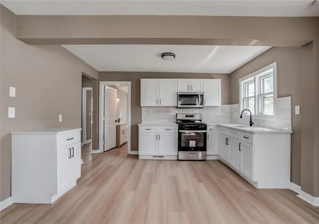 Photo 2 of Single family home for sale at 823 S Olive St, Ottawa, KS 66067 | MLS# 2649476 | Listing updated on 2026-10-31