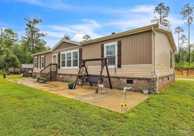 Photo 2 of Manufactured home for sale at 9918 Amos Cabaniss Rd, Milton, FL 32570 | MLS# 684322 | Listing updated on 2026-07-09