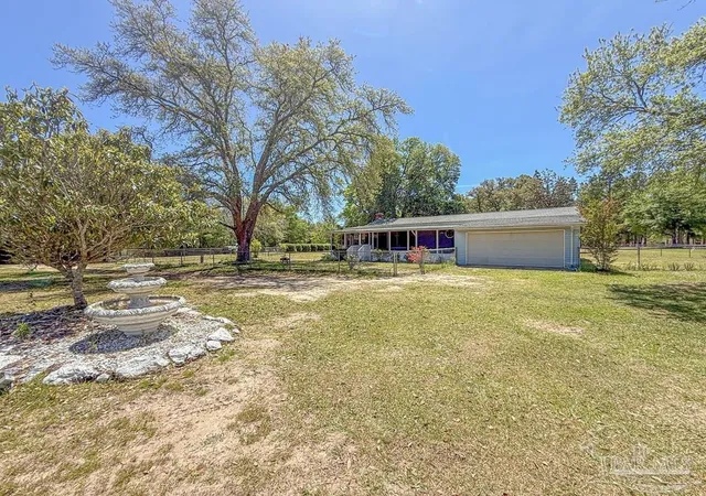 4th image of 10000 Shangri La West Rd, Milton, FL 32583 | MLS# 681009