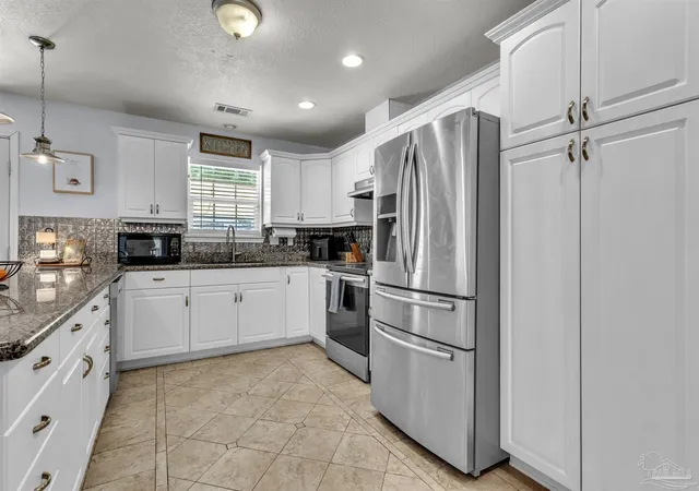 Photo 3 of Single family home for sale at 7093 Wymart Rd, Pensacola, FL 32526 | MLS# 681514 | Listing updated on 2026-10-07