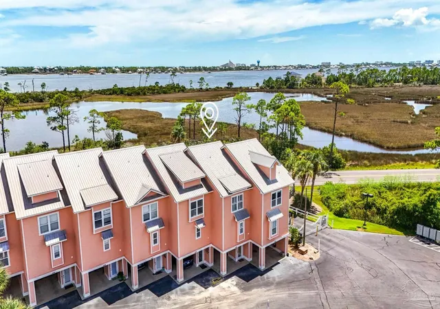 Listing Photo 1 - Condo for sale in building located at 16038 Innerarity Pt Rd, Pensacola, FL 32507 - Unit #101