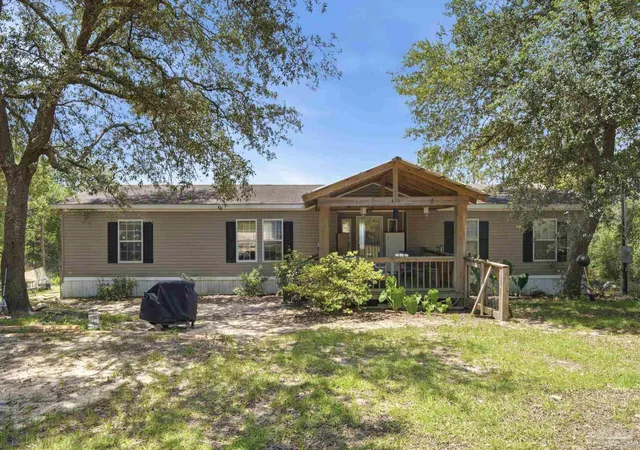 1st image of 439 Woodpecker Ln, Holt, FL 32564 | MLS# 685864