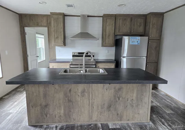 Photo 3 of Manufactured home for sale at 8588 Alvarado Calzada, Pensacola, FL 32507 | MLS# 661583 | Listing updated on 2026-09-25