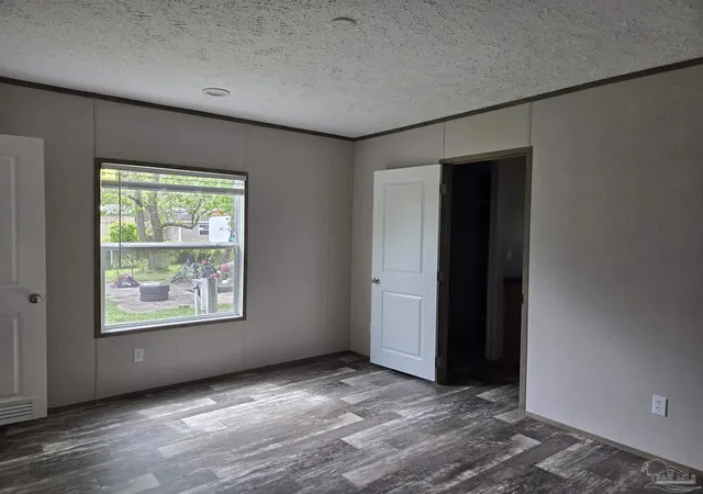 Photo 4 of Manufactured home for sale at 8588 Alvarado Calzada, Pensacola, FL 32507 | MLS# 661583 | Listing updated on 2026-09-25