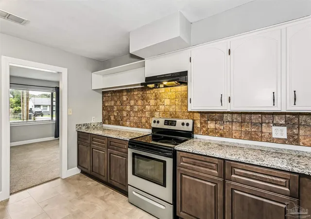 Photo 2 of Single family home for sale at 702 N 49th Avenue, Pensacola, FL 32506 | MLS# 683921 | Listing updated on 2026-09-09