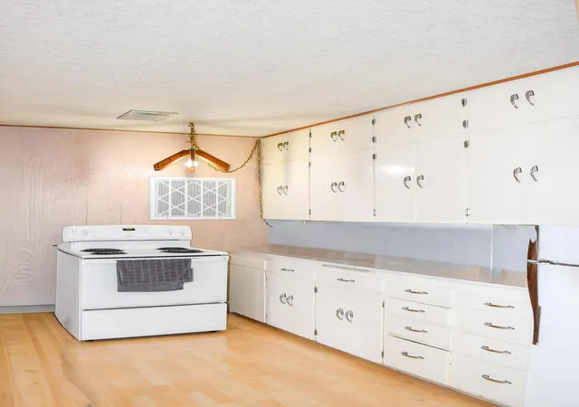 Photo 1 of Multi family home for sale at 414 & 414 1/2 Buchanan St Sw, Ronan, MT 59864 | MLS# 30060173 | Listing updated on 2026-10-02