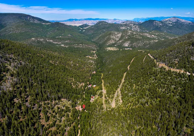 Photo 3 of Land for sale at 4253 Woods Crk Rd, Wolf Creek, MT 59648 | MLS# 30066472 | Listing updated on 2026-07-03