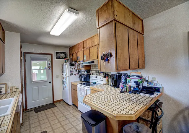 Photo 3 of Single family home for sale at 1308 5th Street E, Polson, MT 59860 | MLS# 30075256 | Listing updated on 2026-07-23
