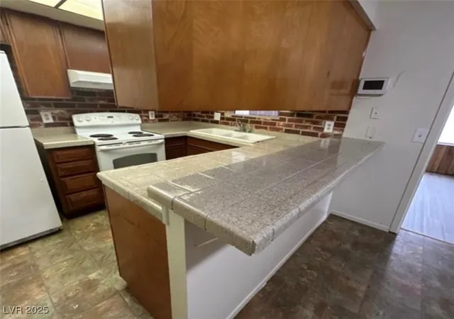 Photo 4 of Single family home for sale at 309 Rossmoyne Ave, North Las Vegas, NV 89030 | MLS# 2731735 | Listing updated on 2025-11-01