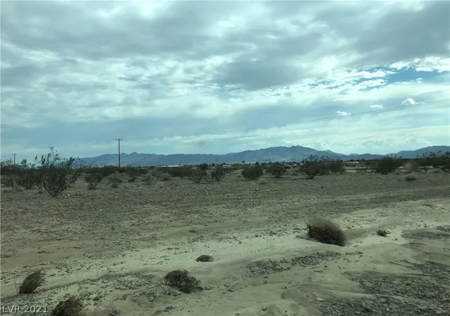 Photo 4 of Land for sale at 3541 Frontage Rd, Pahrump, NV 89060 | MLS# 2328491 | Listing updated on 2025-03-13