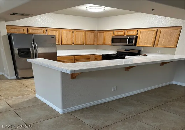 Photo 2 of Condo for sale at 1404 Seward St #104, Las Vegas, NV 89128 | MLS# 2746125 | Listing updated on 2026-08-24