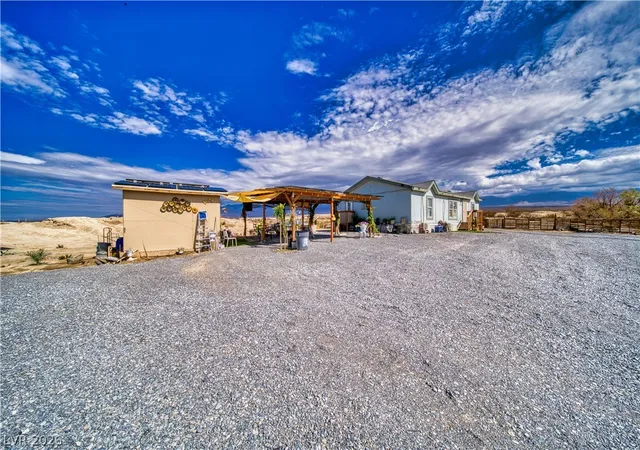 Photo 1 of Manufactured home for sale at 1440 E Irene St, Pahrump, NV 89060 | MLS# 2782067 | Listing updated on 2026-06-19