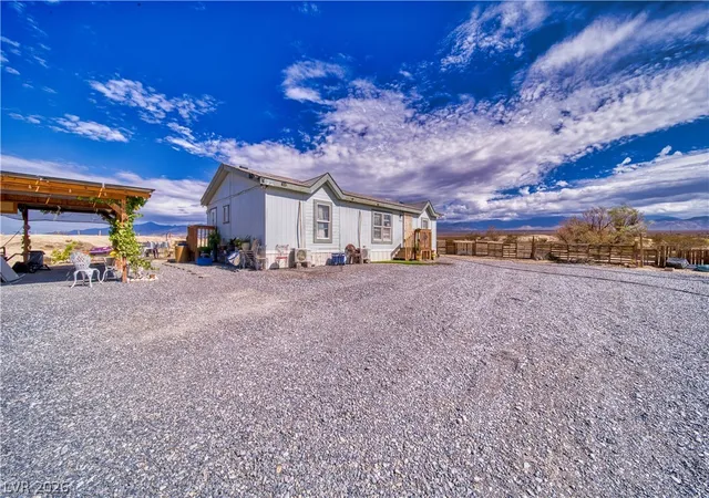Photo 2 of Manufactured home for sale at 1440 E Irene St, Pahrump, NV 89060 | MLS# 2782067 | Listing updated on 2026-06-19