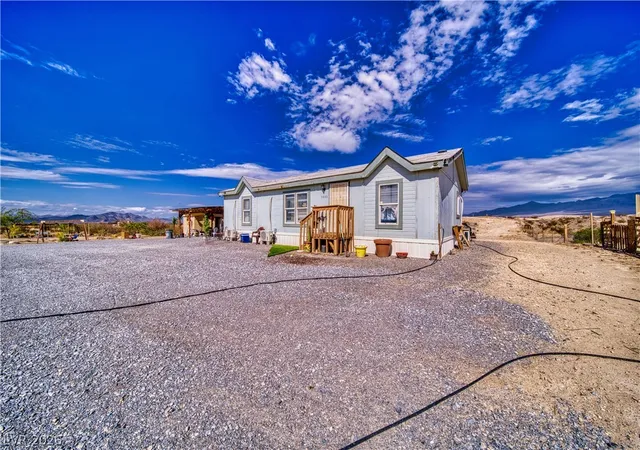 Photo 3 of Manufactured home for sale at 1440 E Irene St, Pahrump, NV 89060 | MLS# 2782067 | Listing updated on 2026-06-19
