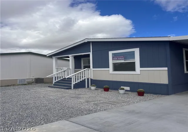Photo 3 of Manufactured home for sale at 410 Candle Stick Ave, Pahrump, NV 89048 | MLS# 2786721 | Listing updated on 2026-07-22