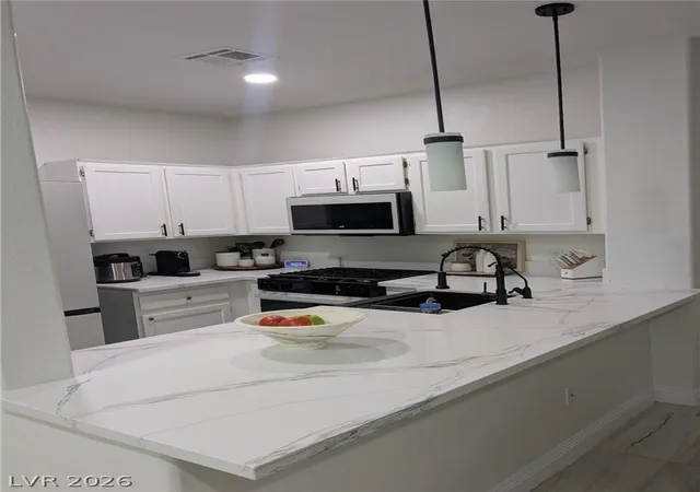 Photo 3 of Townhouse for sale at 1104 Dusty Crk St, Las Vegas, NV 89128 | MLS# 2794523 | Listing updated on 2026-07-13