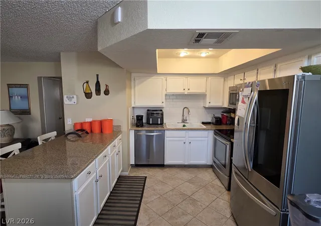 Photo 4 of Condo for sale at 932 Boulder Mesa Dr #102, Las Vegas, NV 89128 | MLS# 2810877 | Listing updated on 2026-08-22